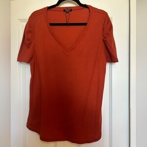 Women's V-Neck Rust Waffle Knit Top with gathered sleeves